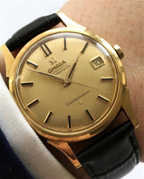 omega constellation gold.